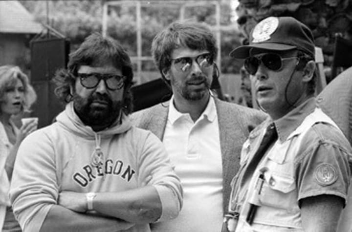 Hollywood superproducers Don Simpson and Jerry Bruckheimer on location with director Tony Scott.