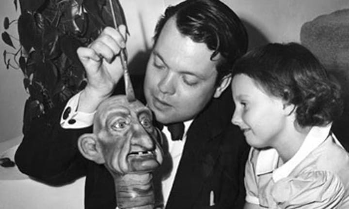 Photo of Orson Welles with his daughter Christopher