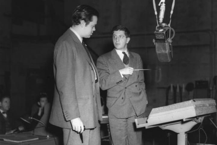 Photo of Orson Welles with composer Bernard Herrmann.